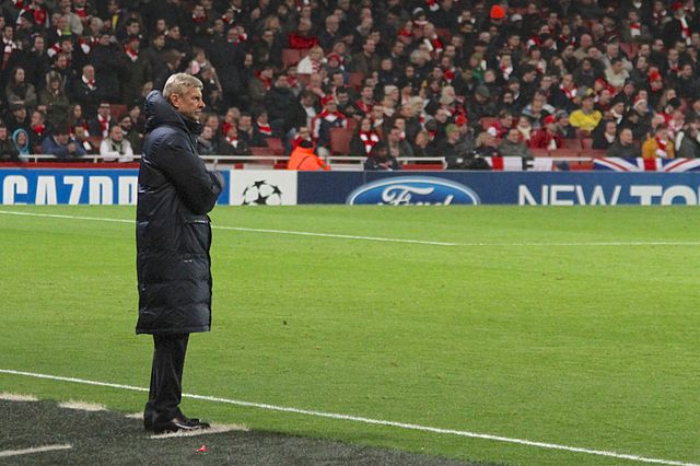 Arsène Wenger looks on. Photo: Ronnie Macdonald